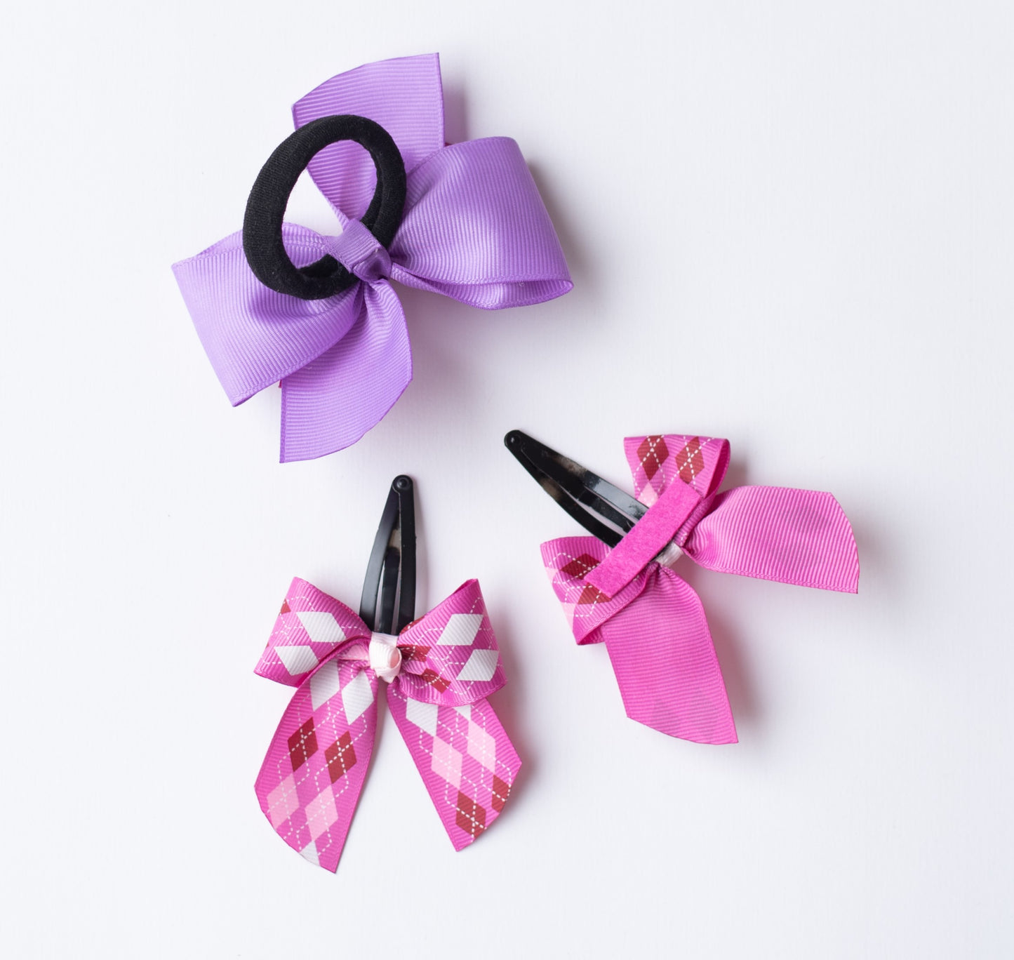 Combo : Cute checkered print bow on tic-tac pins and dual bow rubberband - Pink and Purple