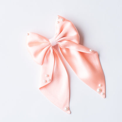 Big fancy satin bow on alligator clip embellished with pearls - Peach