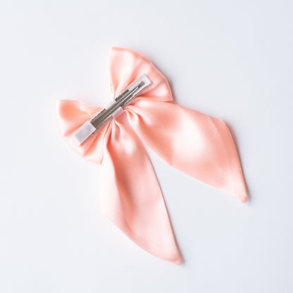 Big fancy satin bow on alligator clip embellished with pearls - Peach