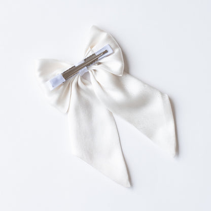 Big fancy satin bow on alligator clip embellished with pearls - White