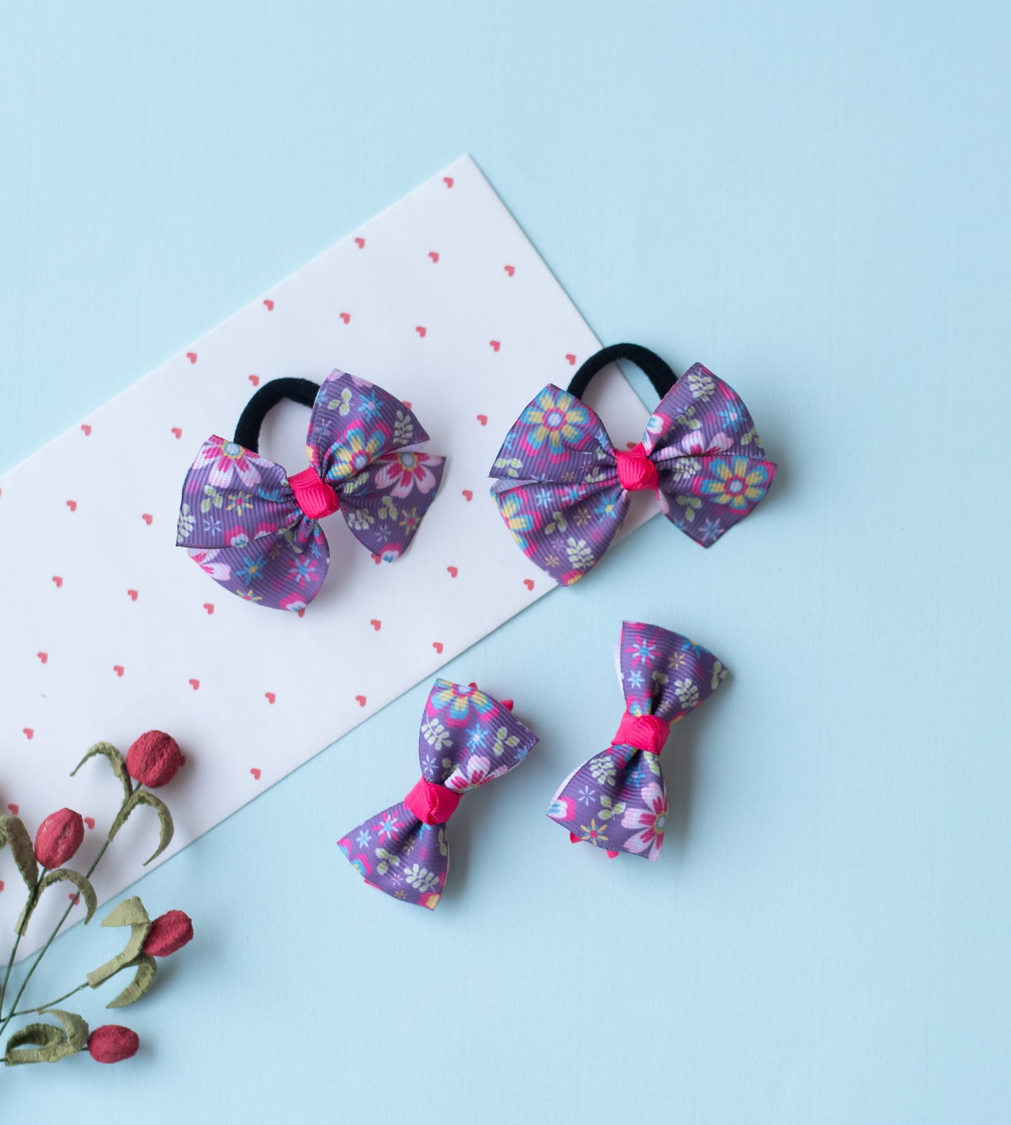 Combo: Floral print small bow on alligator clips and matching small rubberbands - Purple.