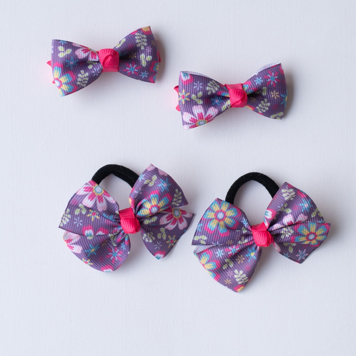 Combo: Floral print small bow on alligator clips and matching small rubberbands - Purple.