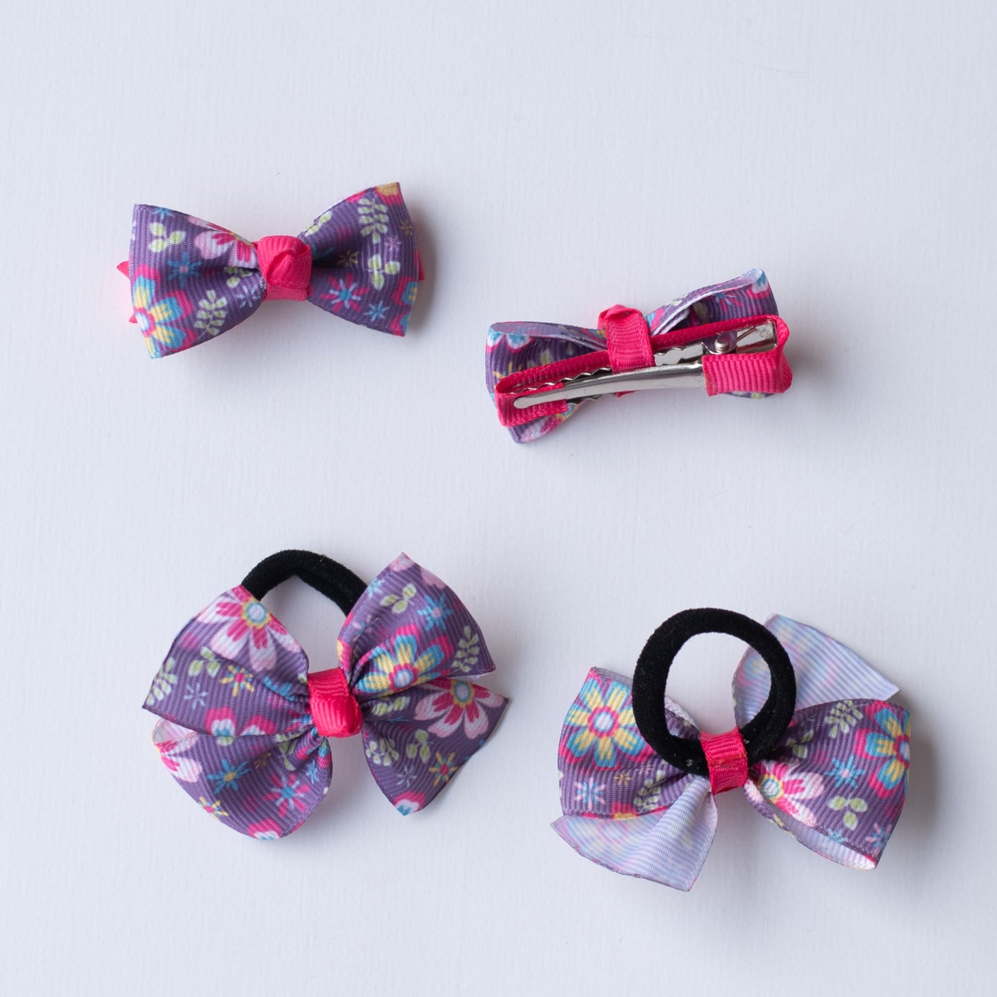 Combo: Floral print small bow on alligator clips and matching small rubberbands - Purple.