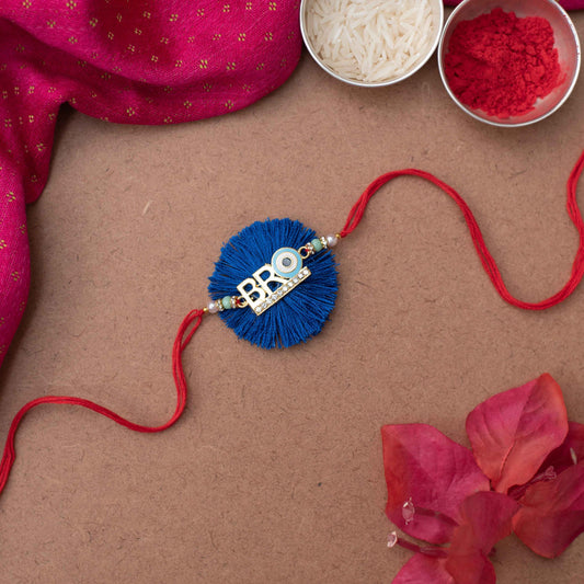 Handmade stylish 'Bro' Charm Rakhi with evil eye - Blue, Red