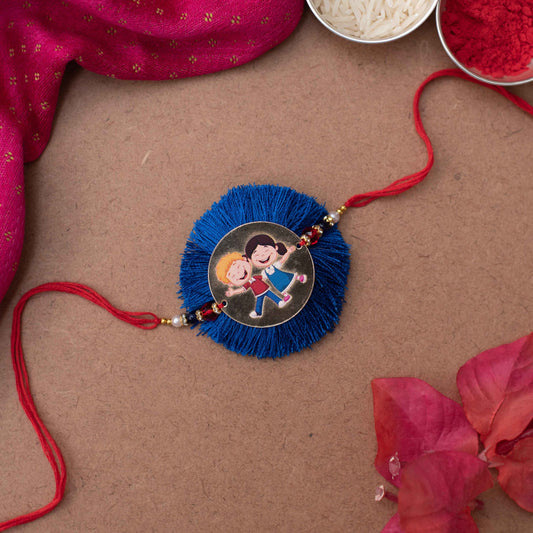 Handmade Rakhi with a cute Brother & Sister charm #1 - Navy, Gold, Red